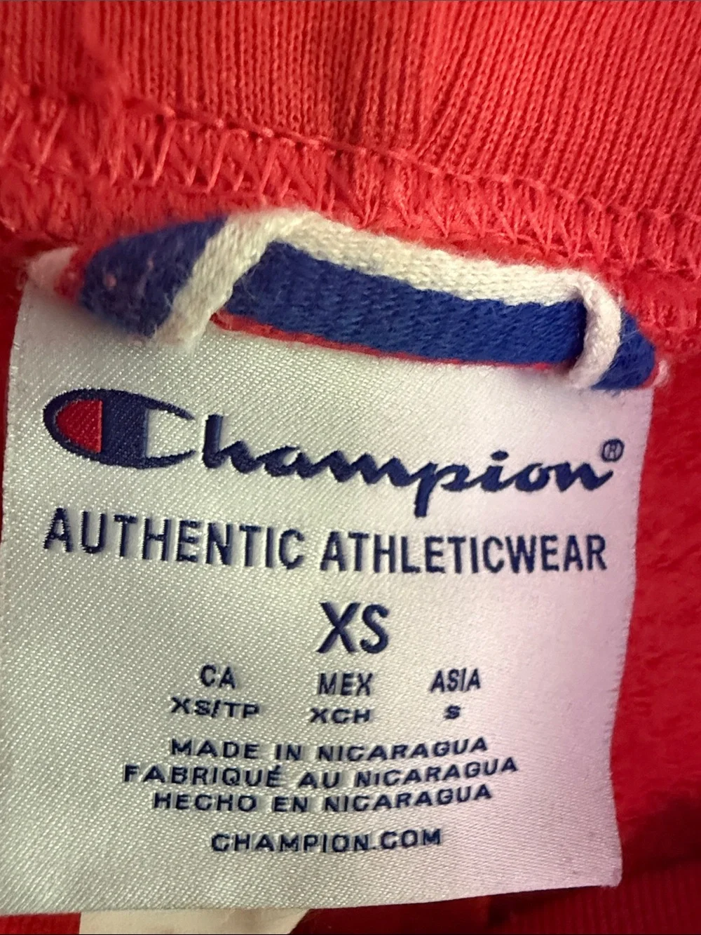 Champion Woman’s Bright Orange Logo Joggers with Script Side Graphic